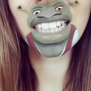 人才英化妆师在嘴边巧画趣味卡通人物7049432教育图片库大视野