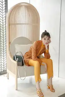 李斯羽橙色系造型惊艳亮相丸子头少女感十足