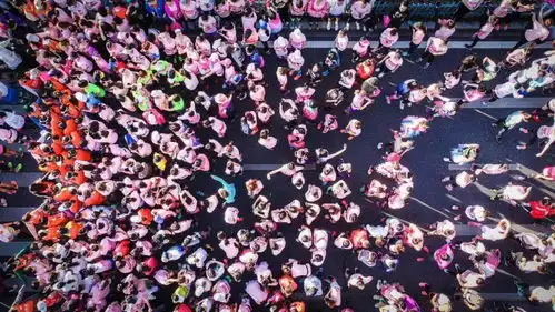 就在周日风靡全球的女子马拉松空降杭州,这片粉色即将开跑