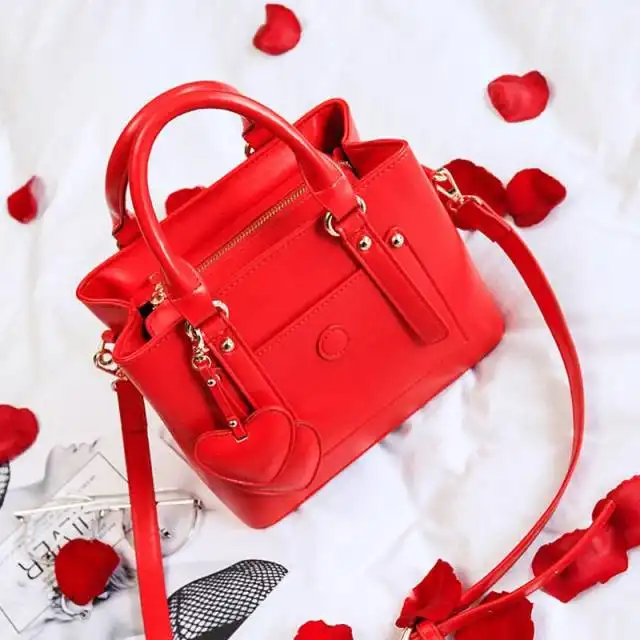 结婚新娘包里放什么新娘包必须是红色的么选择婚包要注意什么