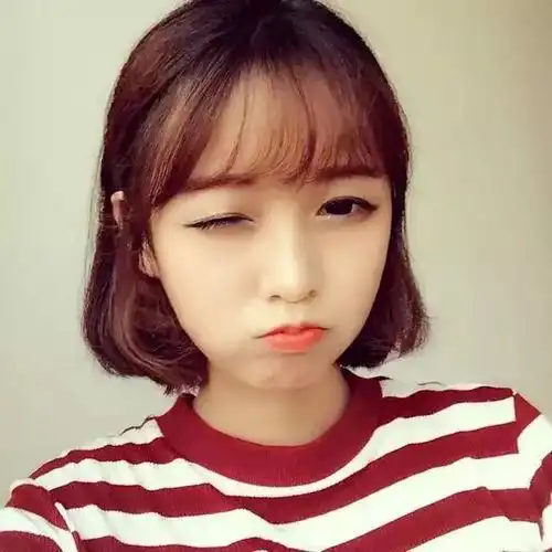 橙色系短发女生头像知性