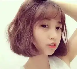 橙色系短发女生头像脸大